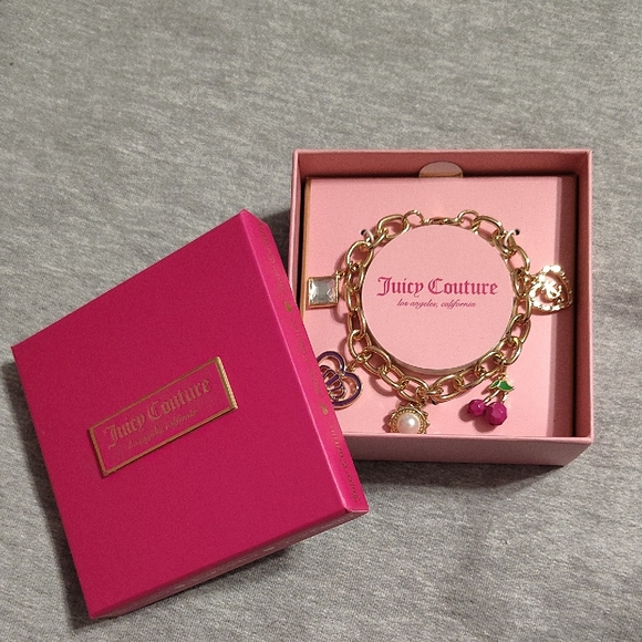 Juicy Couture Jewelry - Juicy Couture Gold and Pink Charm Bracelet